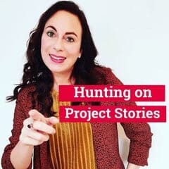 A woman holding a sign that says hunting on project stories